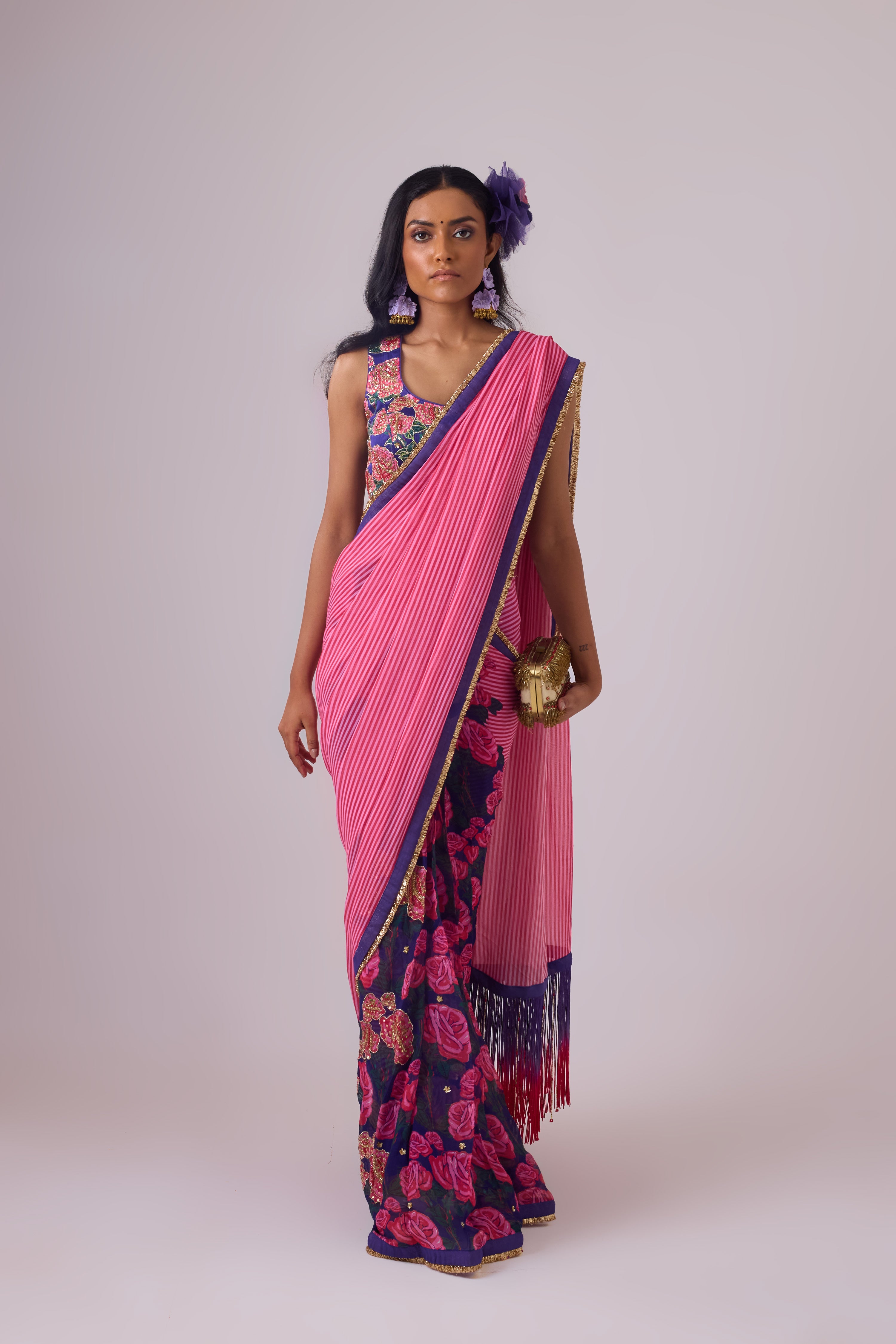 GEORGETTE STRIPED AND ROSE PRINTED SAREE WITH FRINGES DETAIL PAIRED WITH EMB. FLORAL BLOUSE