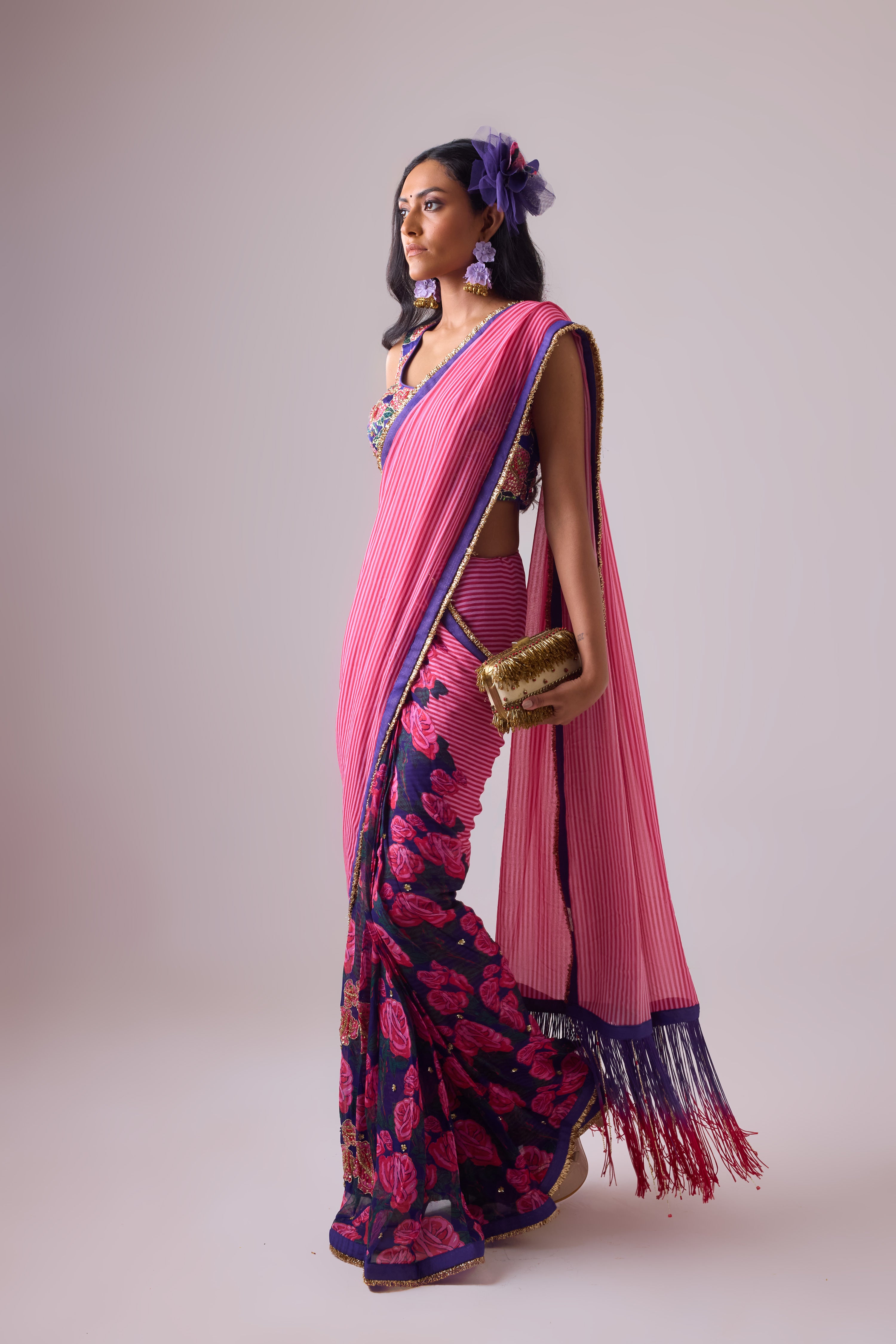 GEORGETTE STRIPED AND ROSE PRINTED SAREE WITH FRINGES DETAIL PAIRED WITH EMB. FLORAL BLOUSE