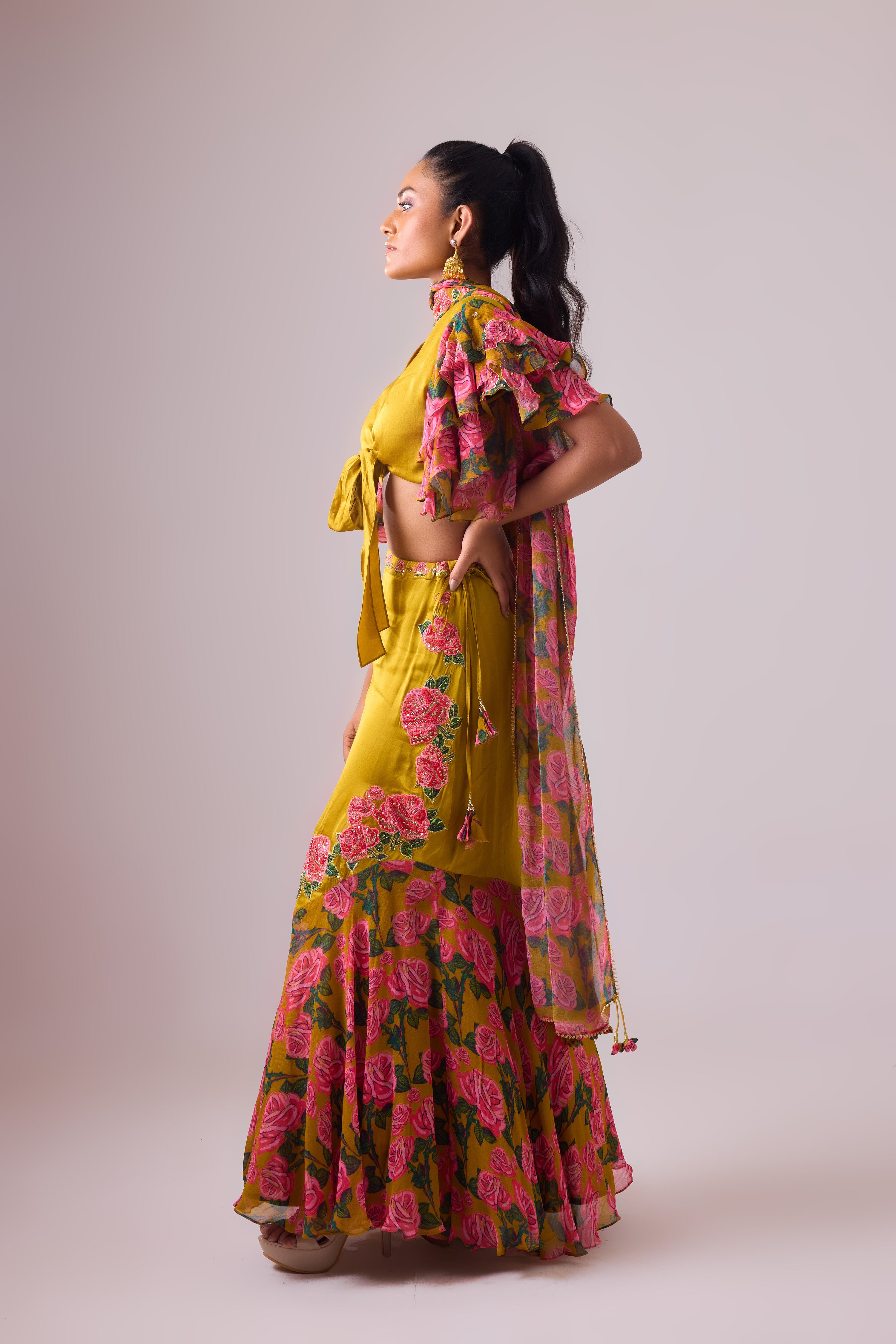 OCHRE LEHENGA  WITH TWIST  OF FRILLS     AND BLOUSE WITH FLARED SLEEVES