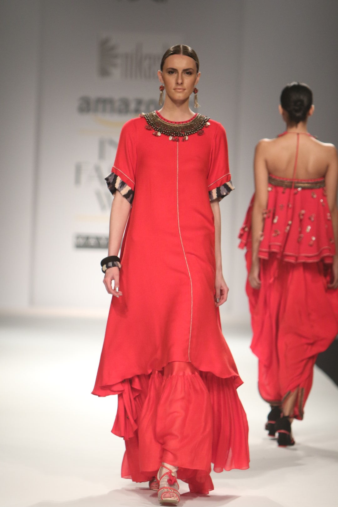 Asymmetric embroidered dress with gathered skirt