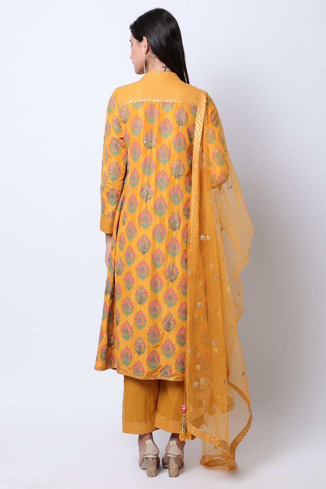 Ochre hand-printed kurta with dupatta and pants.