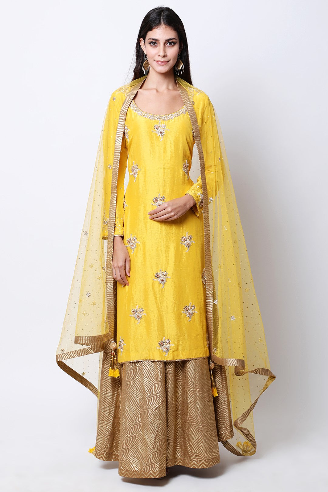 yellow silk kurta with mukesh embellished dupatta and tabacco swirl gold printed wide leg pants.