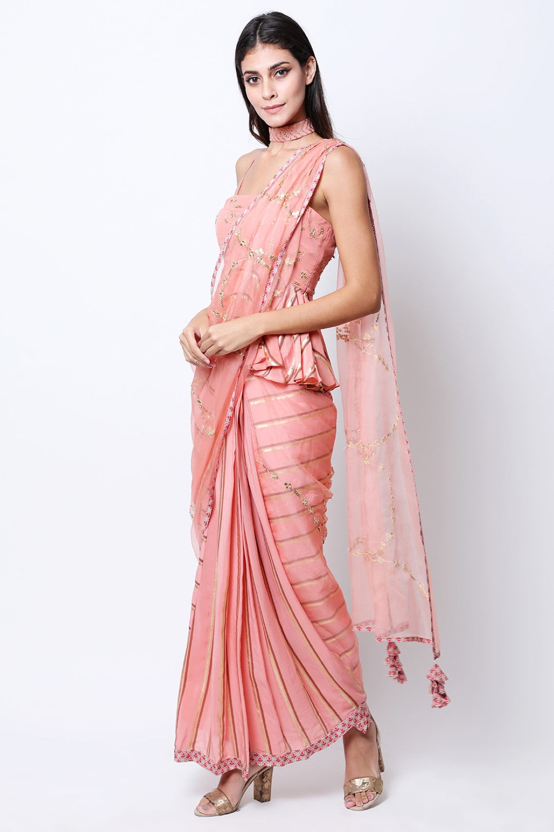Vintage rose leheriya pre-pleated crepe saree with embroidered drape and peplum embroidered blouse.