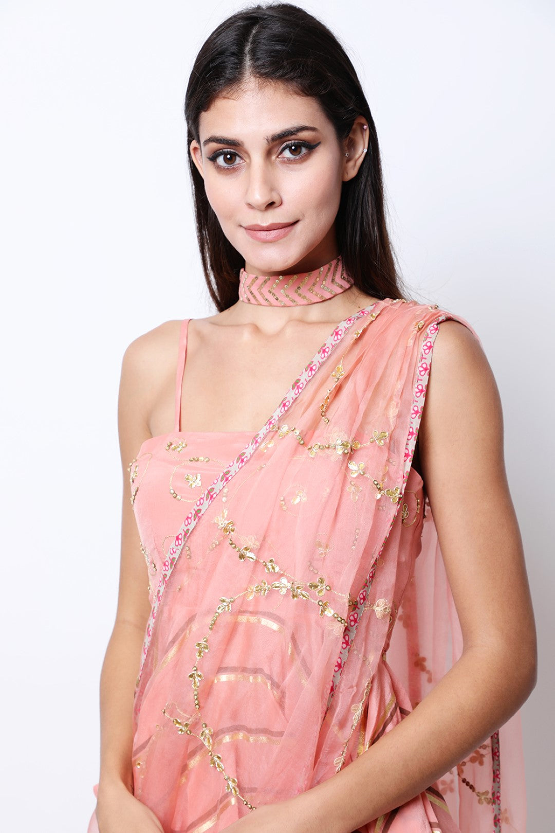 Vintage rose leheriya pre-pleated crepe saree with embroidered drape and peplum embroidered blouse.