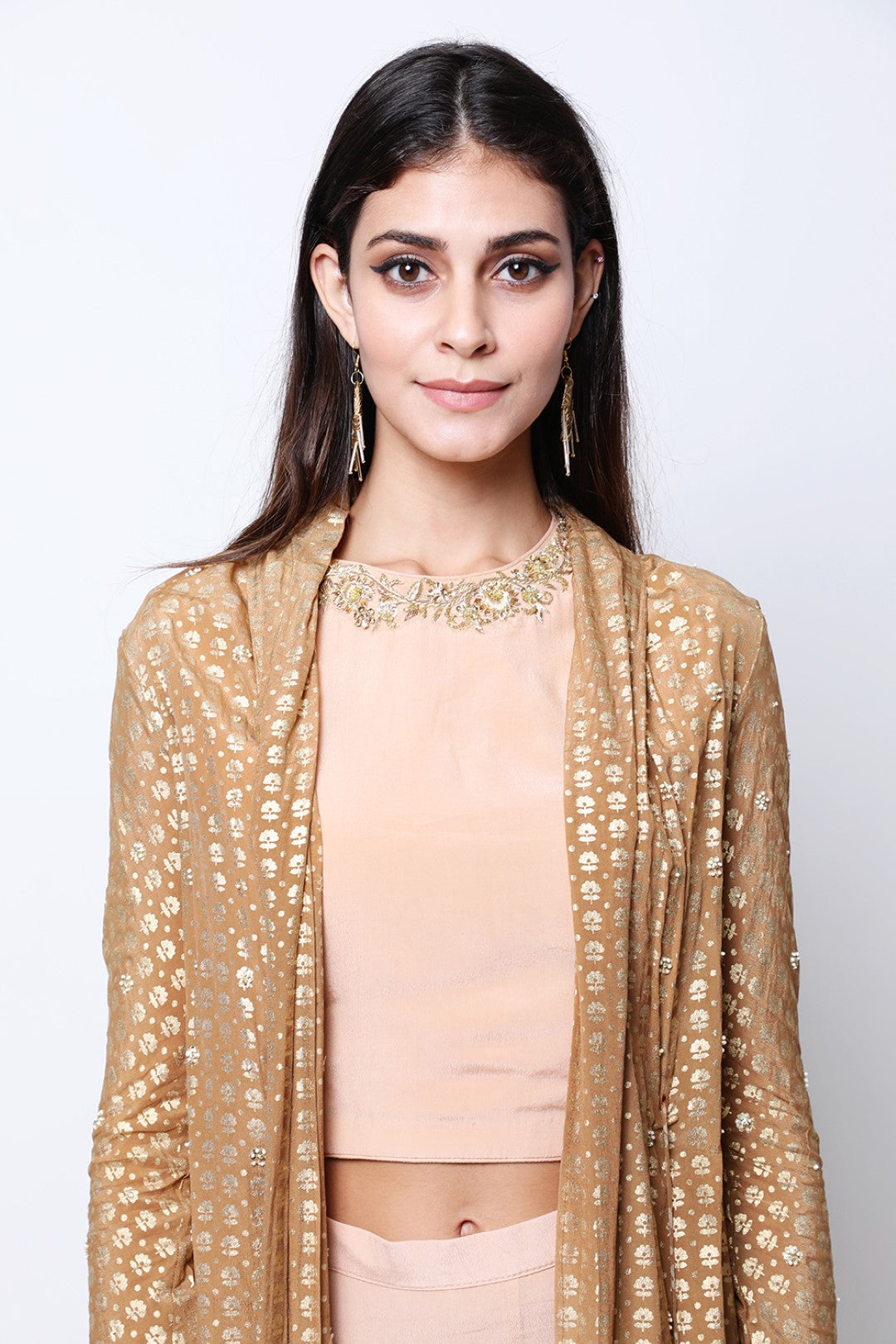 Tabacco gold printed jacket , paired with light tabacco embroidered crop top and sharara.