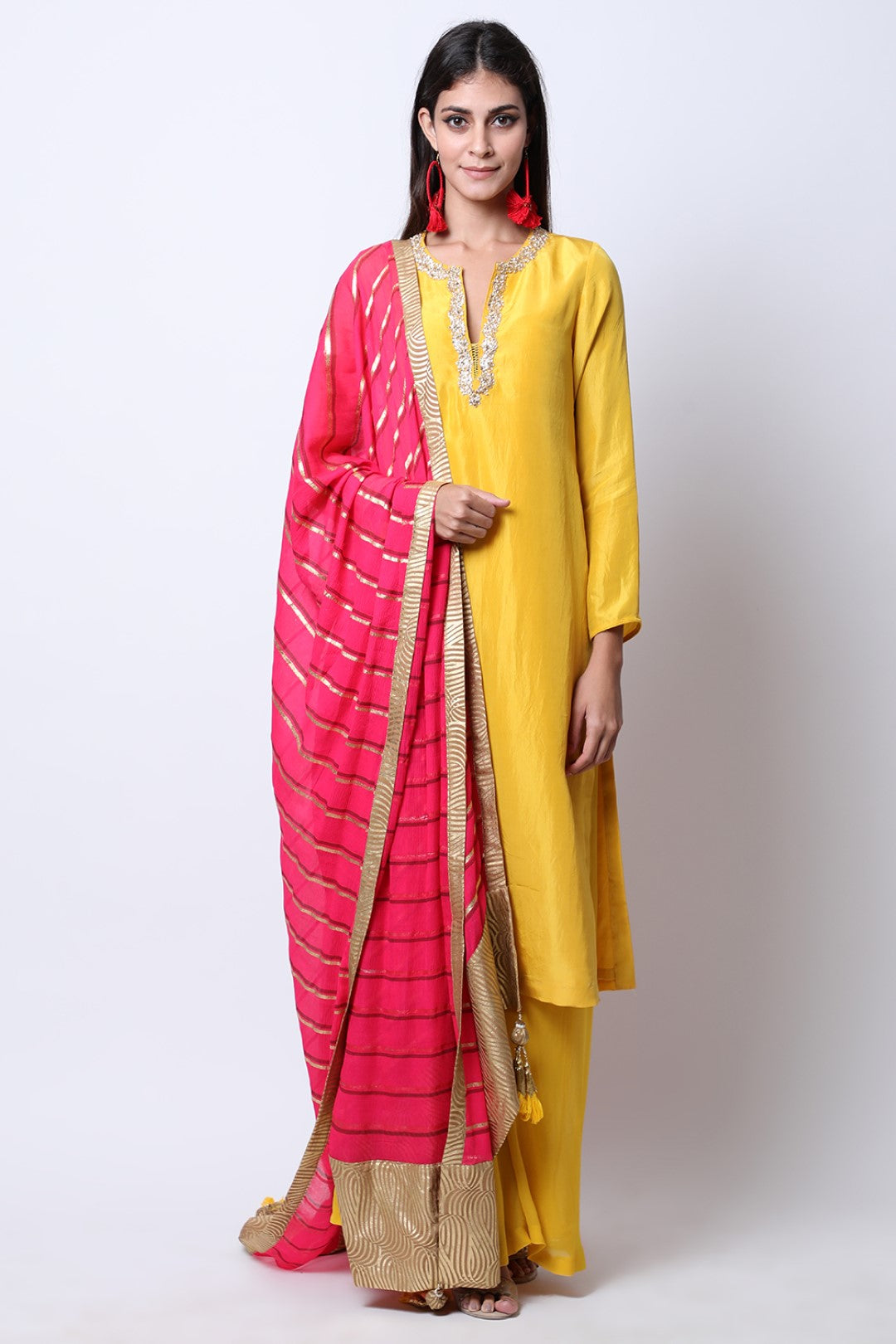 Pitambari Yellow silk kurta with Rose Red dupatta and wide leg sharara.