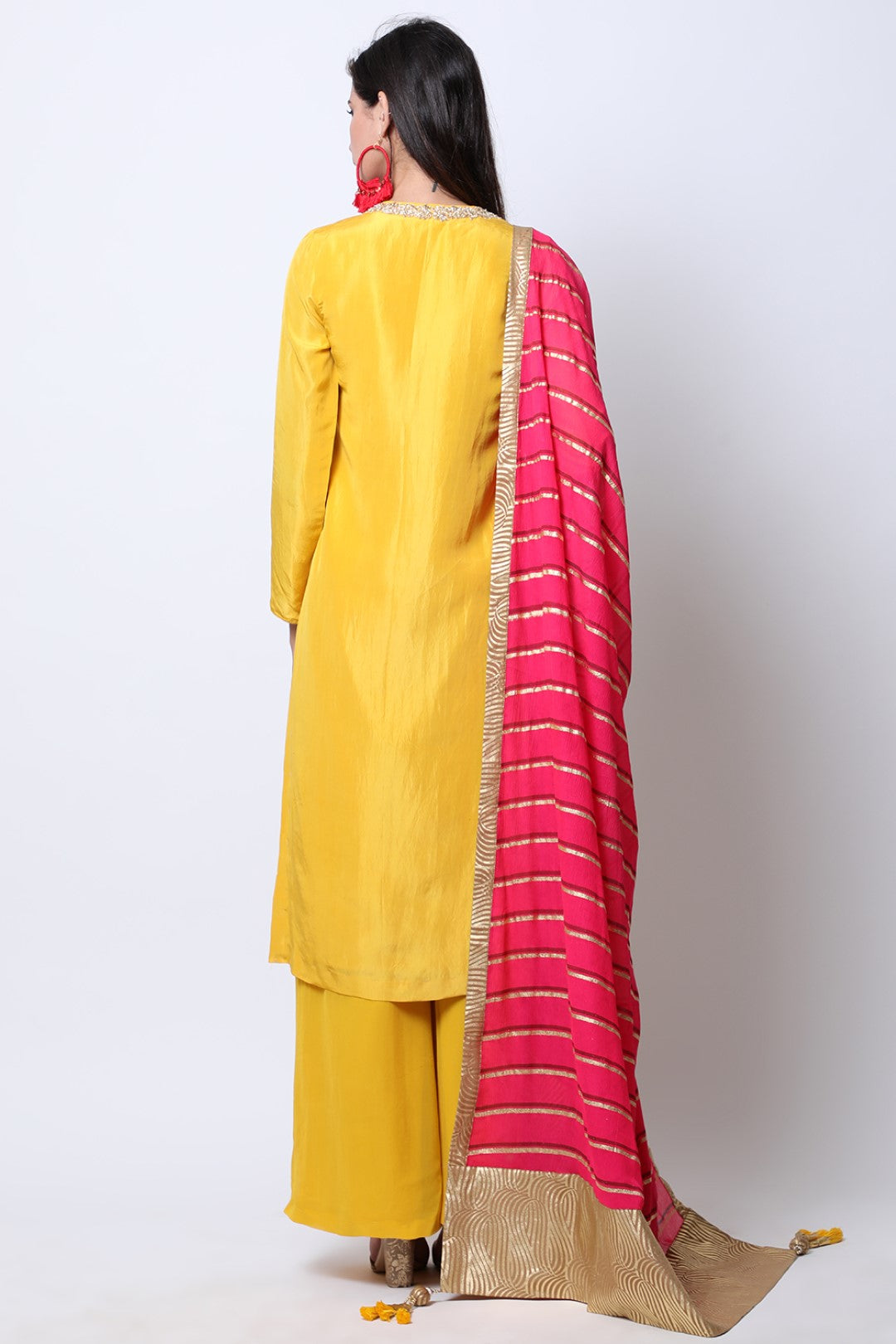 Pitambari Yellow silk kurta with Rose Red dupatta and wide leg sharara.