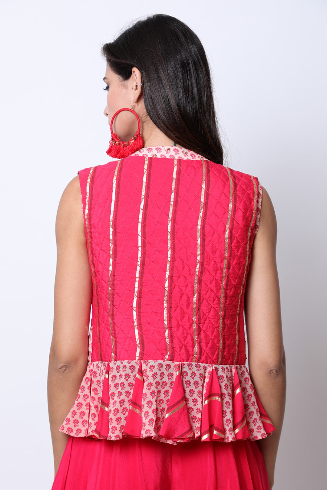 Rose Red quilted waist-coat with poppy printed godets , paired with poppy printed crop top and dhoti.