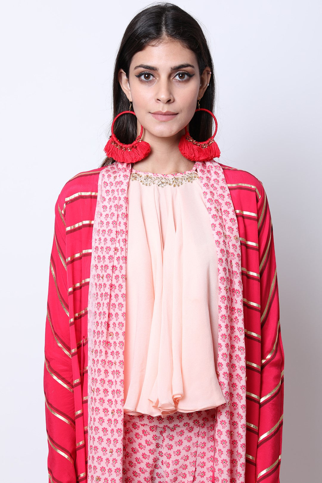 Rose Red leheriya printed jacket with  flare halter neck top and poppy printed dhoti.