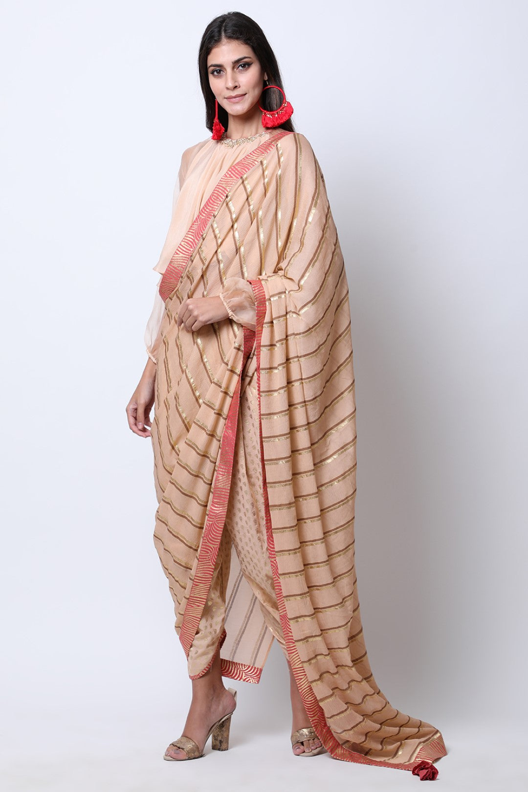 Light Tabacco embroidered blouse , paired with cowl dhoti attached leheriya palla.