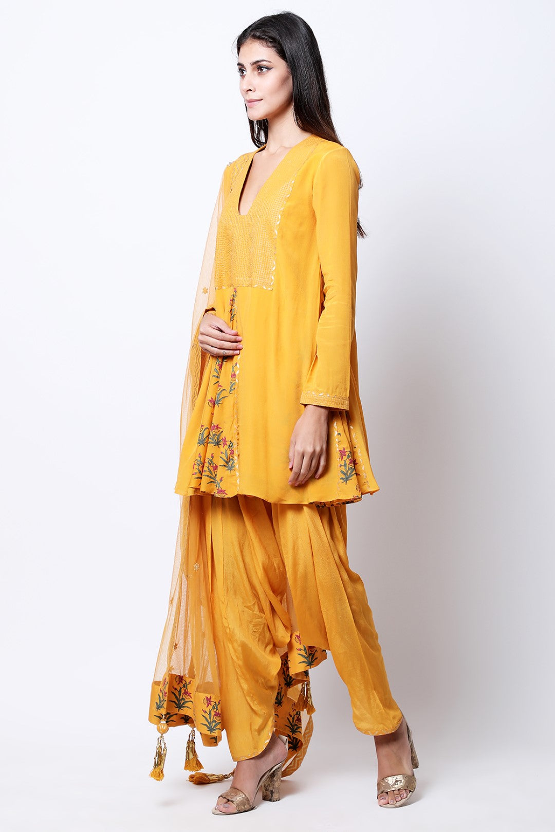 Ochre hand printed front and side godets kurta with mukesh embroidered dupatta and cowl dhoti.
