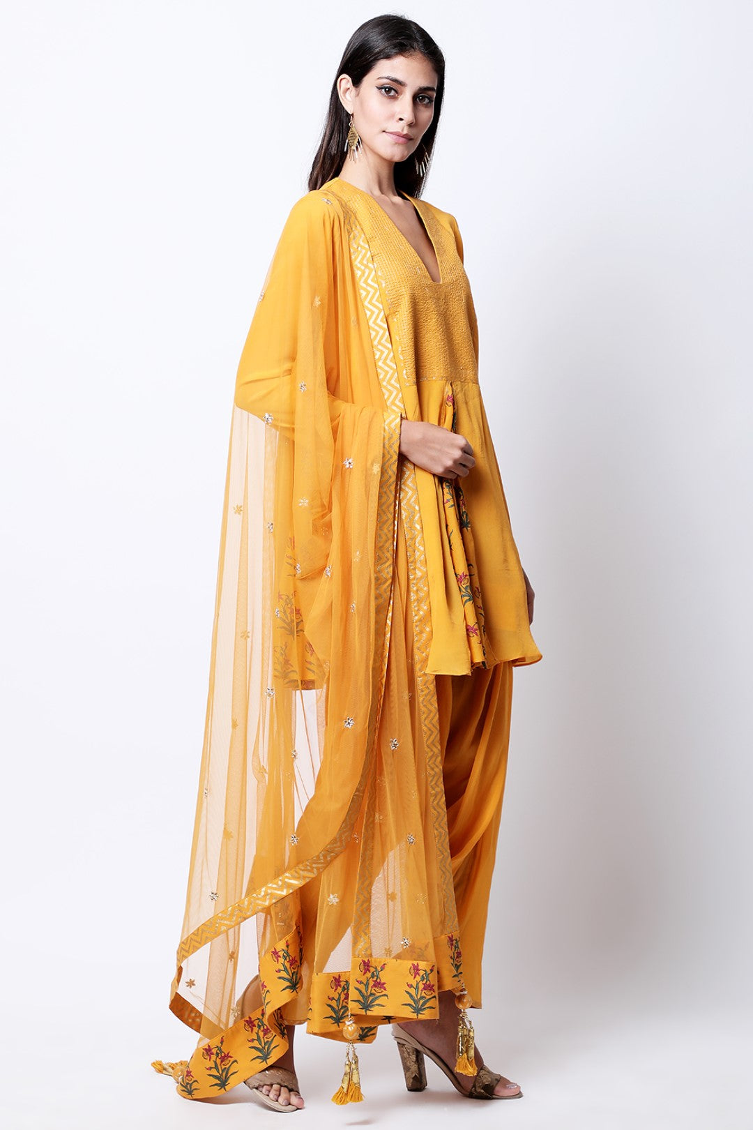 Ochre hand printed front and side godets kurta with mukesh embroidered dupatta and cowl dhoti.