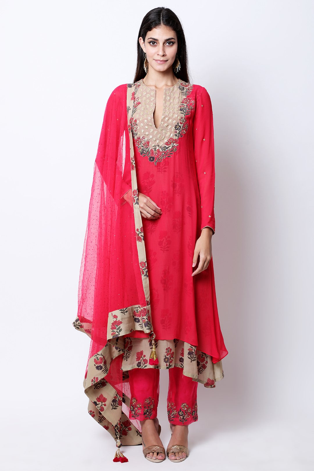 Rose red double layered  asymmetric tunic , paired with mukesh dupatta and pants.