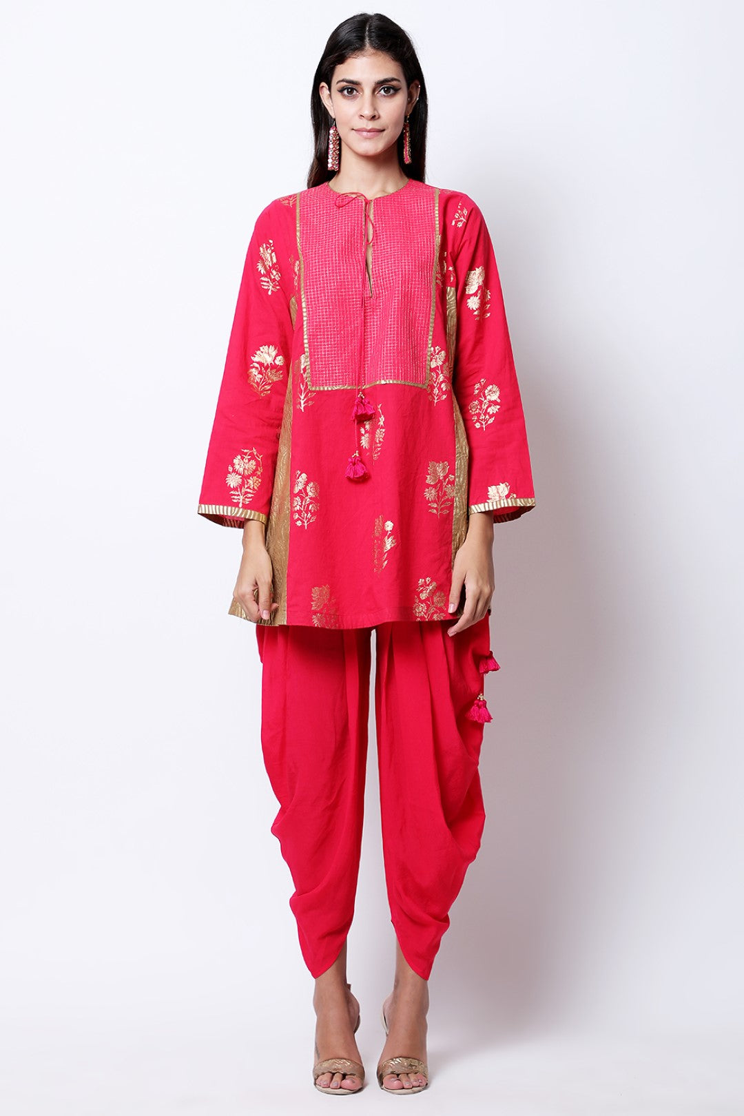 Rani Pink gold printed kurta with chevron side panel details , paired with dhoti.