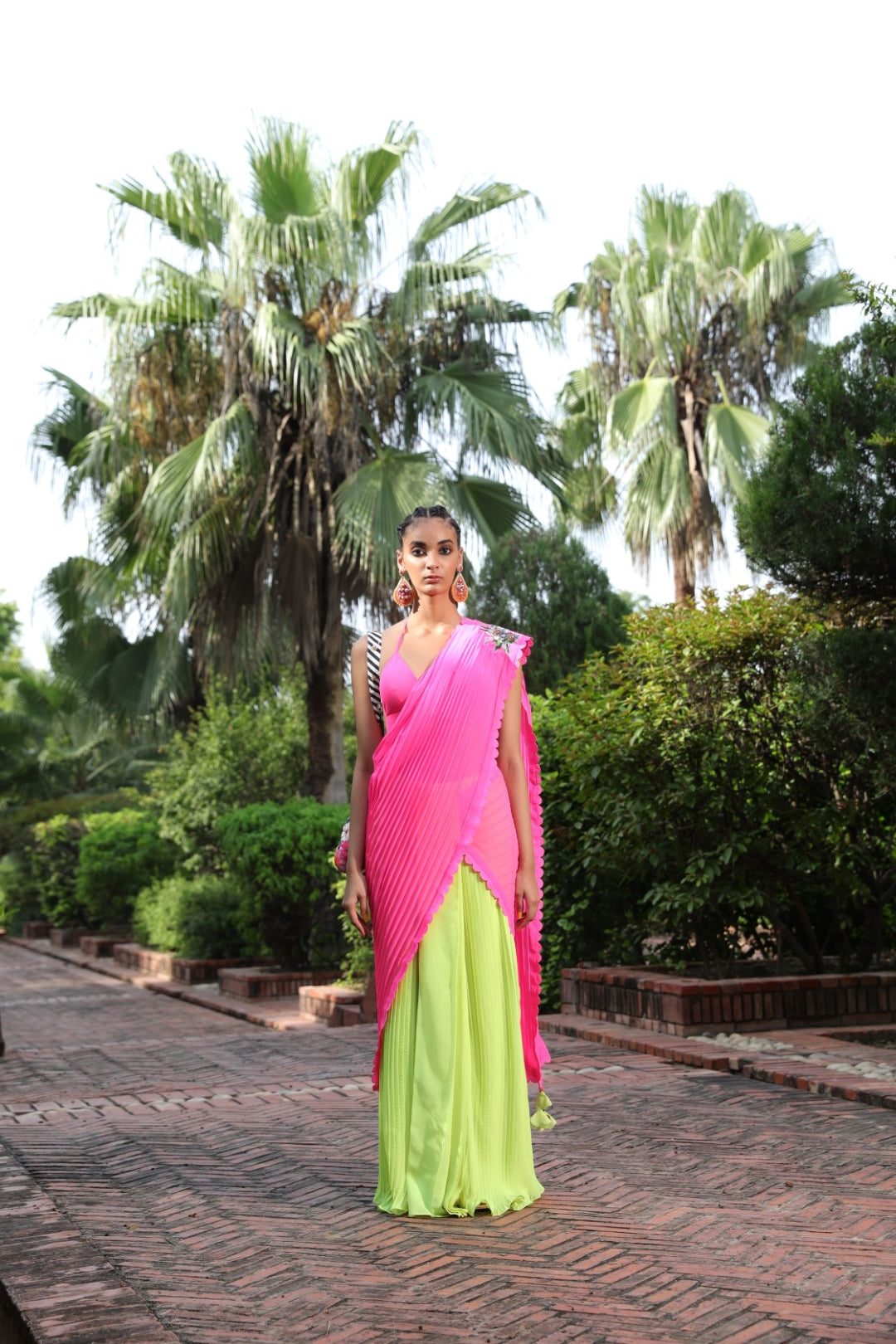 Lime pre-pleated ggt saree with pink palla with pink unstitched blouse fabric