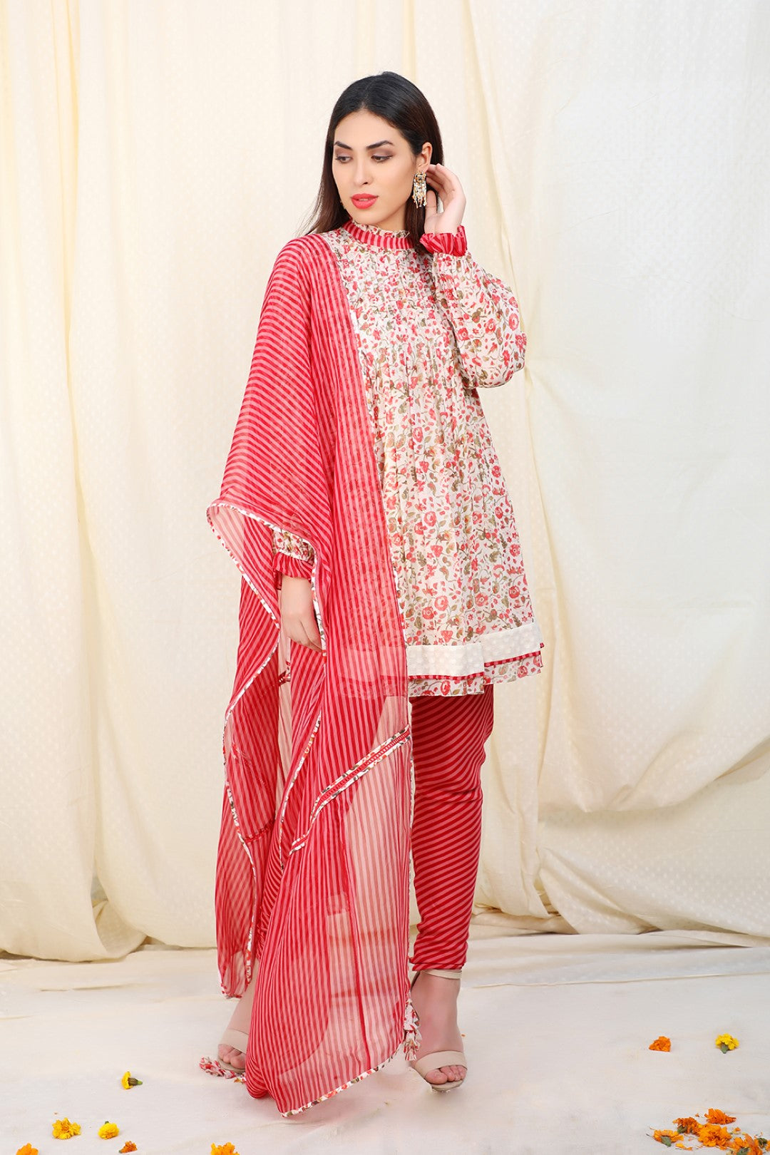 print kurta with crepe churidaar and chiffon dupatta.