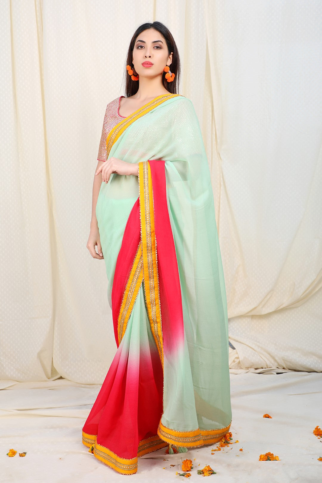 Ombre pista to rose red chiffon saree with haldi abla border
