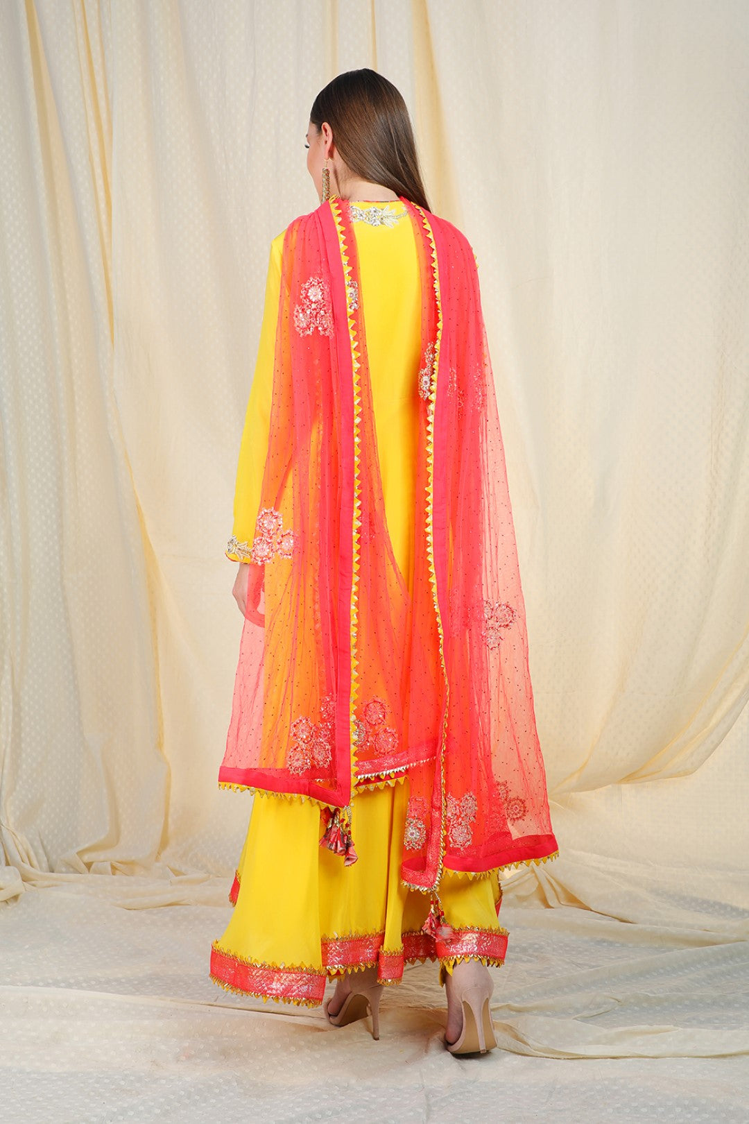 yellow crepe angrakha with coral net dupatta