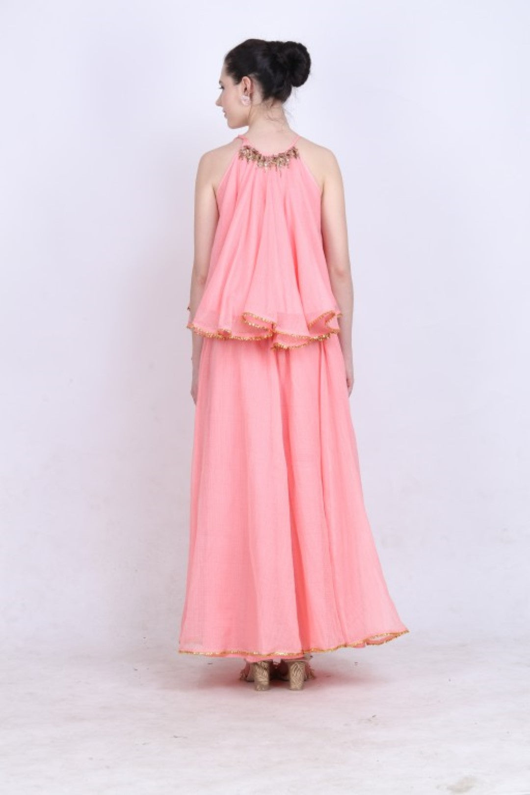 Rose pink kota doria halter neck top with a kota doria skirt with gota lace detailing.