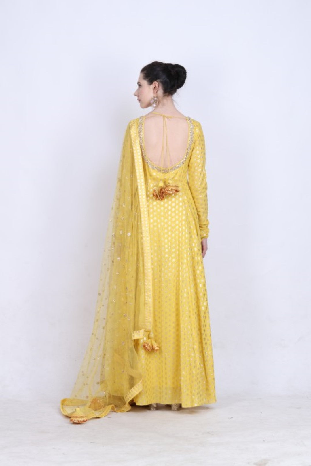 Pitambari yellow gold foil printed embroidered kalidar  with mukesh net dupatta and churidar.