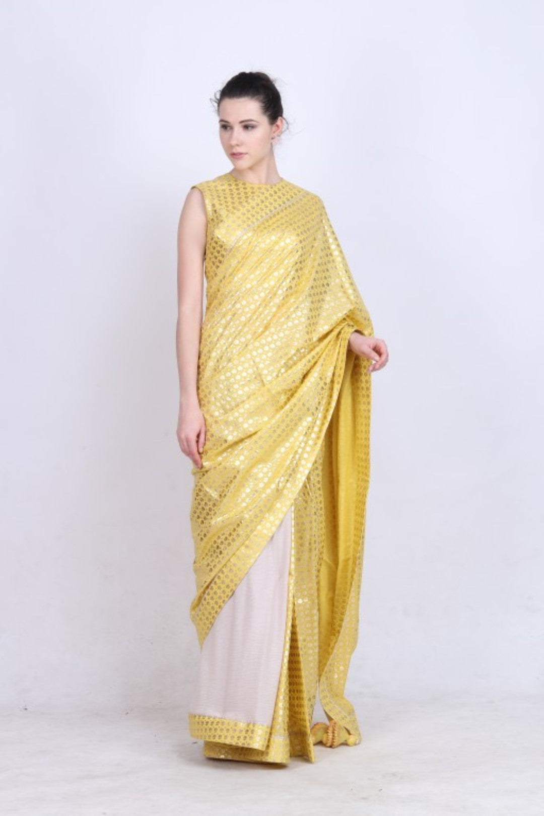 Pitambari yellow gold foil printed crepe  and crushed cotton half & half saree with blouse.