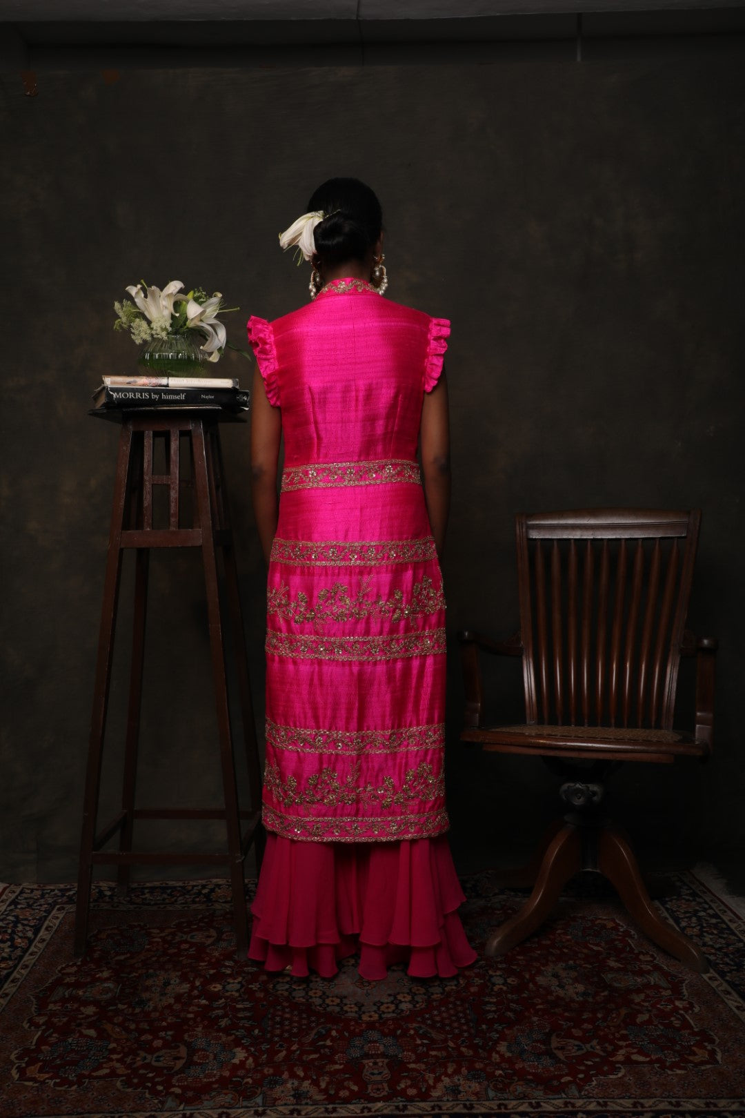 Rani pink raw silk kurta with a double layered sharara and dupatta