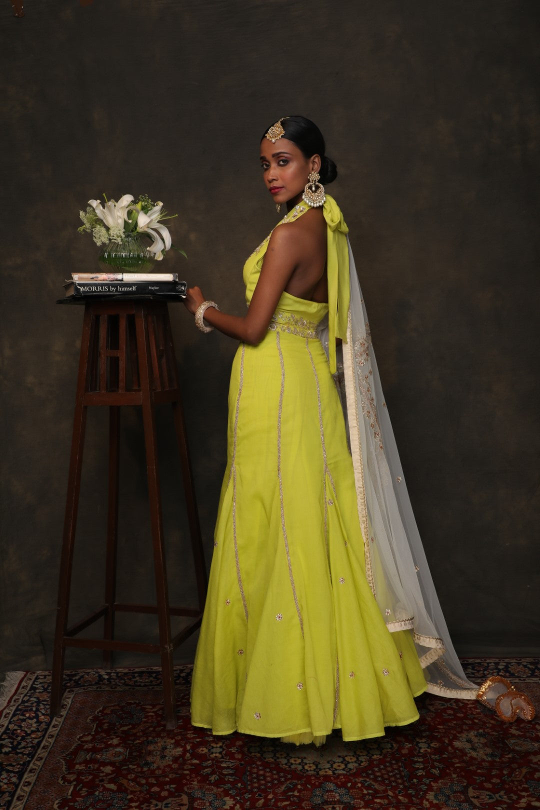 Lime green organdy  fish tail skirt with tie up halter blouse and  ghee dupatta