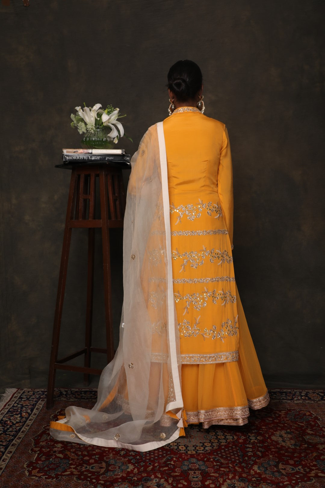 Lily ochre crepe kurta with a soft net skirt and a hand embroidered dupatta