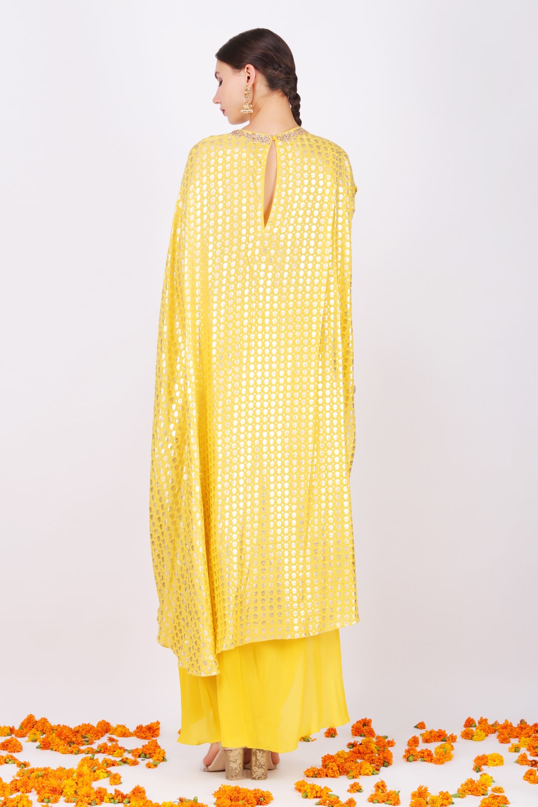 Pitambari yellow crepe foil printed kaftan tunic  with crepe cowl skirt.
