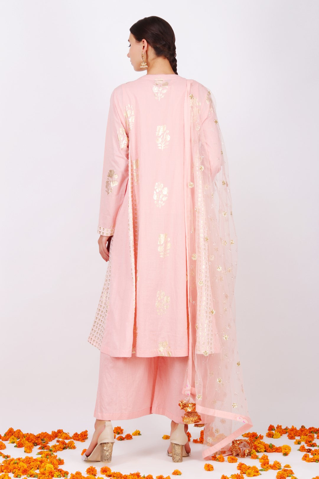 Rose pink kalis kurta with rose pink  mukesh net embroidered dupatta and salmon cotton pleated pant.