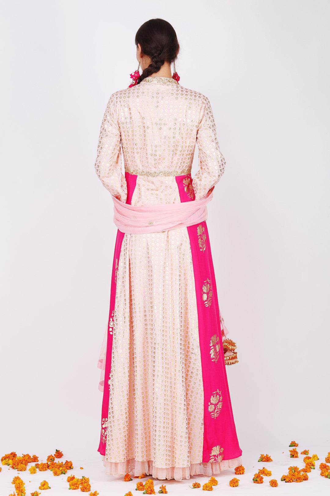 Rose pink  chhotu sanga foil printed raised neckline kalidar with rose pink net embroidered dupatta and churidar.
