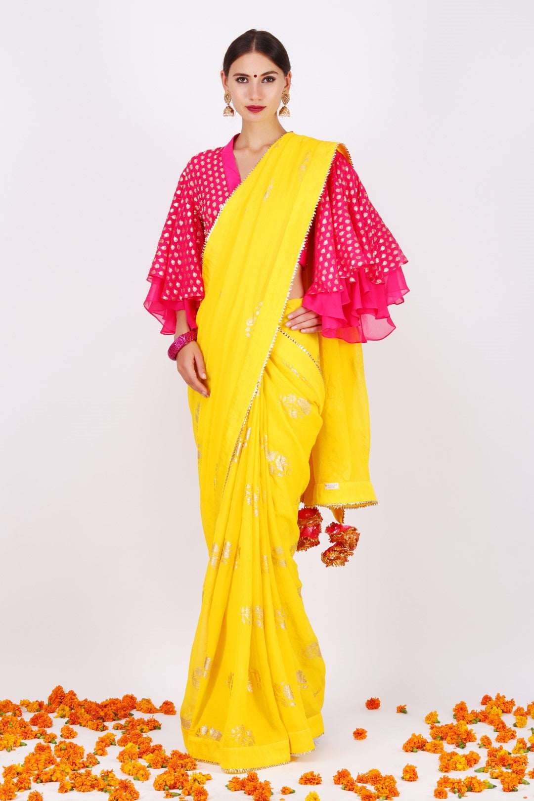 Yellow georgette foil printed sari raised neckline blouse with bell sleeves.
