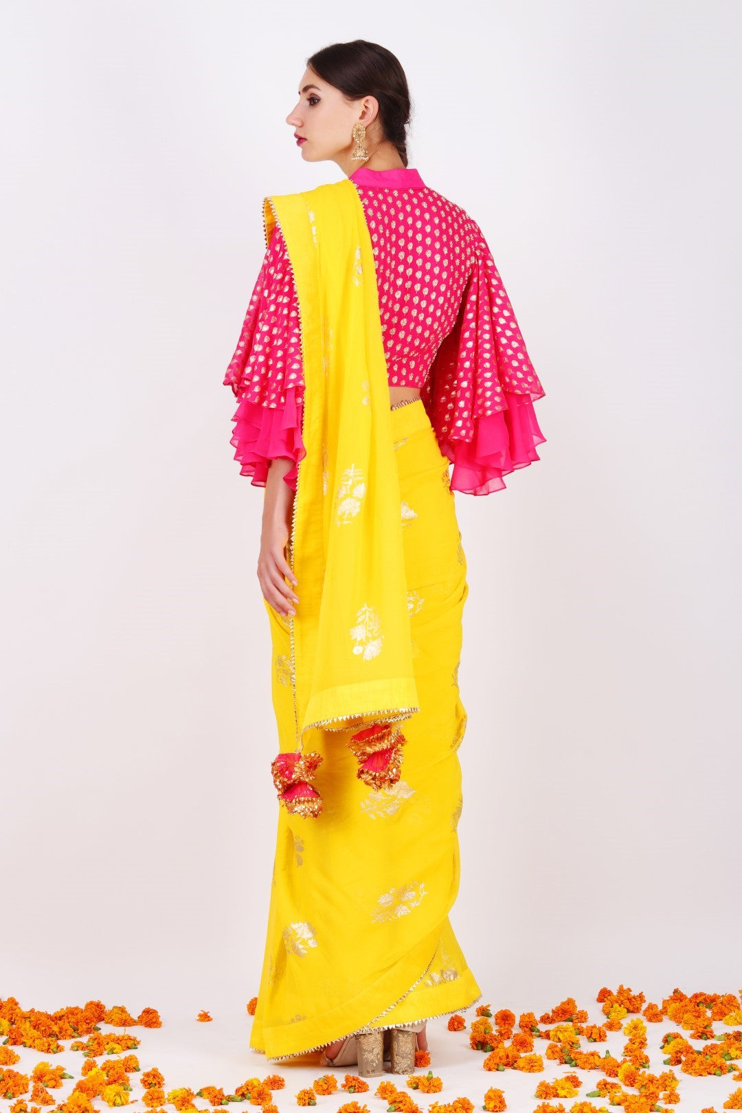 Yellow georgette foil printed sari raised neckline blouse with bell sleeves.