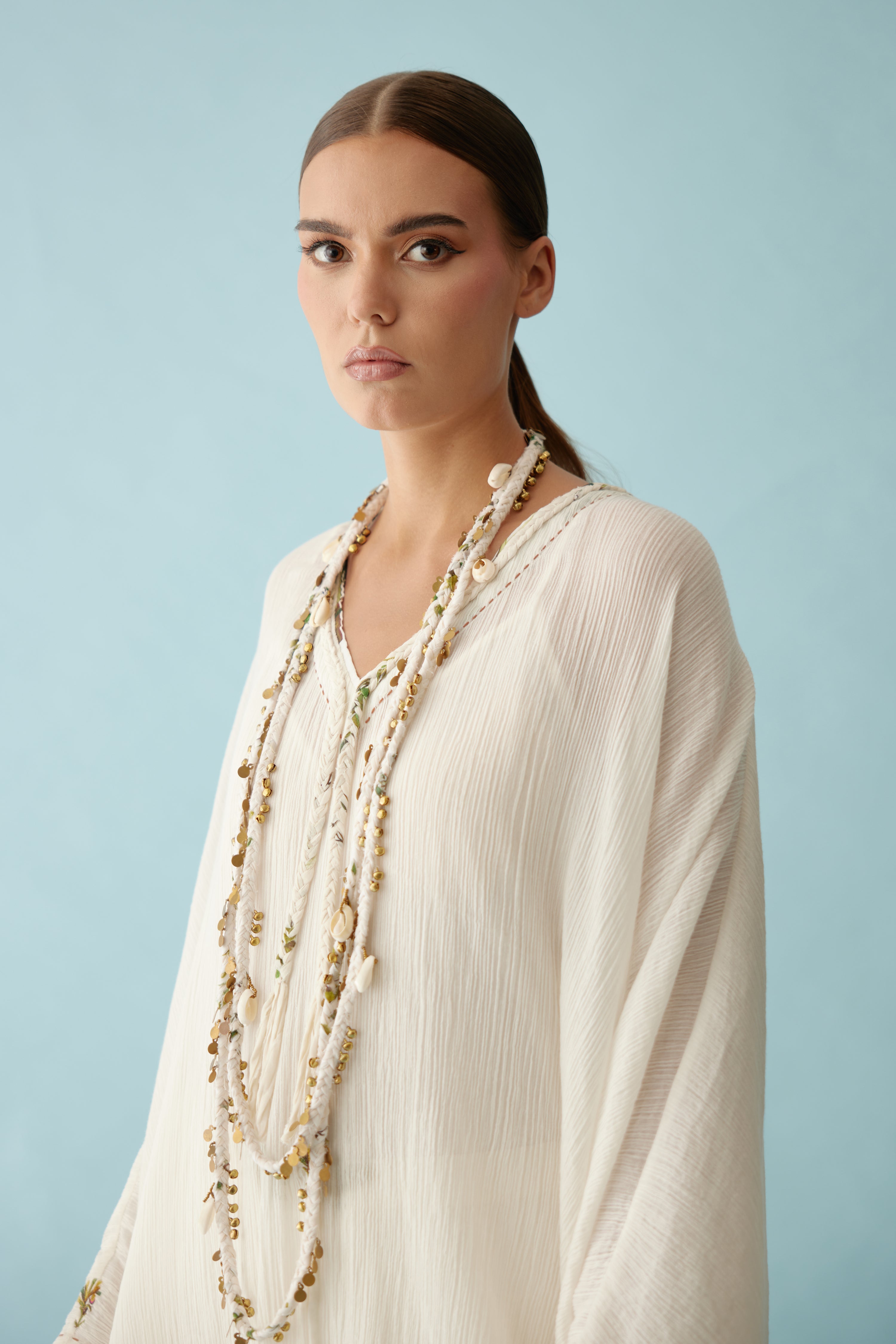 Cream recycled hand-braided ghungroo long necklace