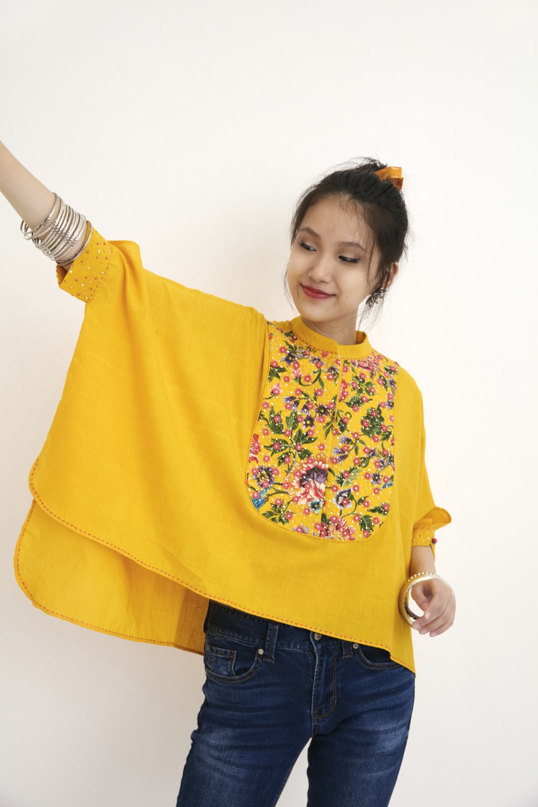 "Handwoven & hand-painted yellow chintz print with hand-embroidered along with beads, sequins & french knots. 100% Handwoven cotton; Lining: 100% cotton  100% Azo Free Dry Clean Only"