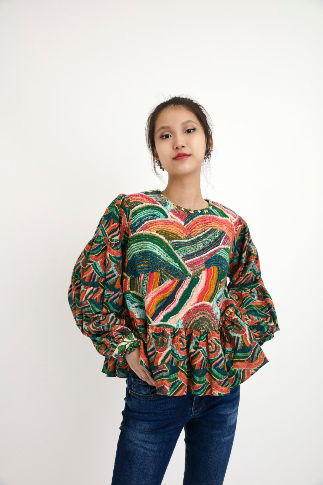 "Handpainted iconic ocean wave multi-color cotton frill top with hand-embroidered with sequins, beads, and flower details. 100% Handwoven cotton silk; Lining: 100% cotton 100% Azo Free Dry Clean Only"