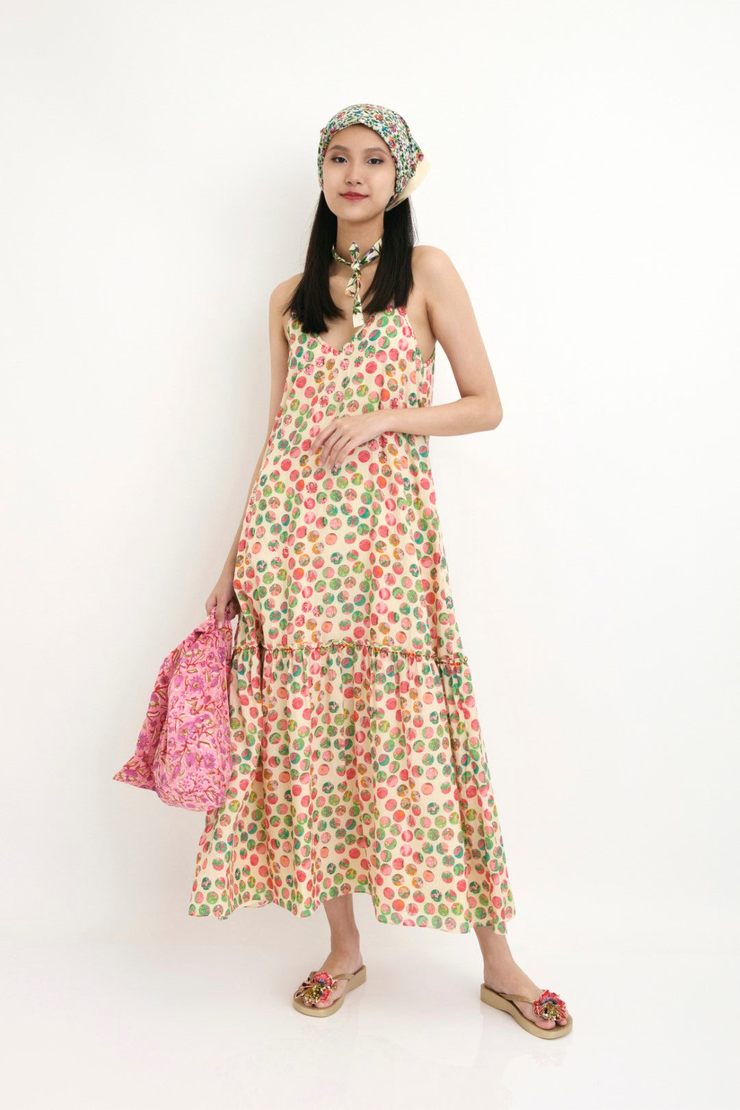 "Handwoven cotton silk polka dot strap dress with pink shaded sequence & hand embroidery detail. 100% Handwoven cotton silk; Lining: 100% cotton 100% Azo Free Dry Clean Only"