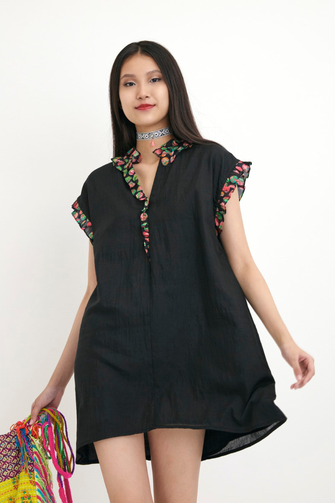 "Handwoven solid cotton silk black tunic with polka dot in frill detail and hand embroidery in sequins detail.  100% Handwoven cotton silk 100%  Azo free"