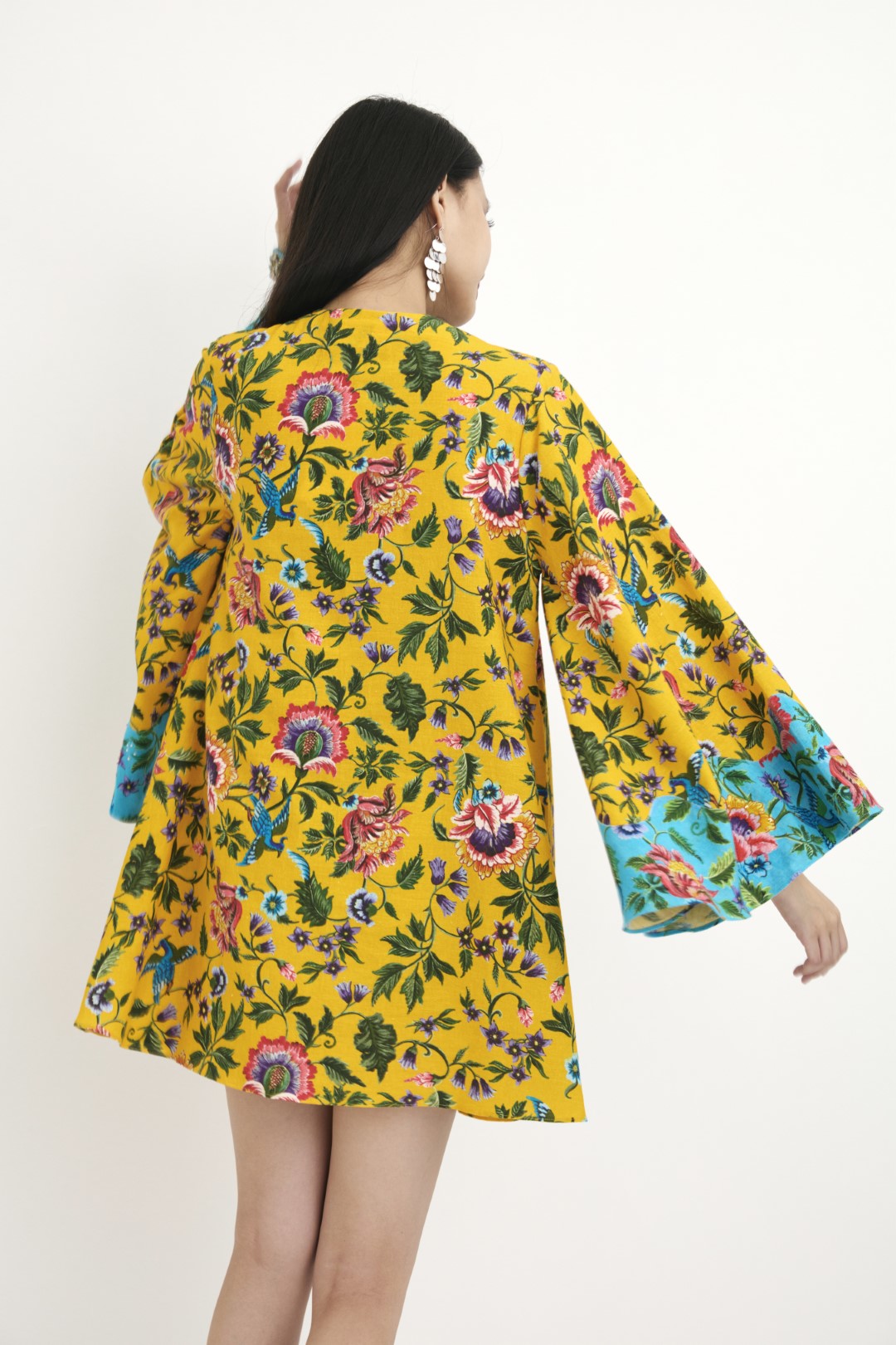 "Handwoven yellow chintz Hand-painted print and blue chintz detailed tunic with hand embroidery in french knots and sequins detail. 100% Handwoven cotton; Lining: 100% cotton 100% Azo Free Dry Clean Only"