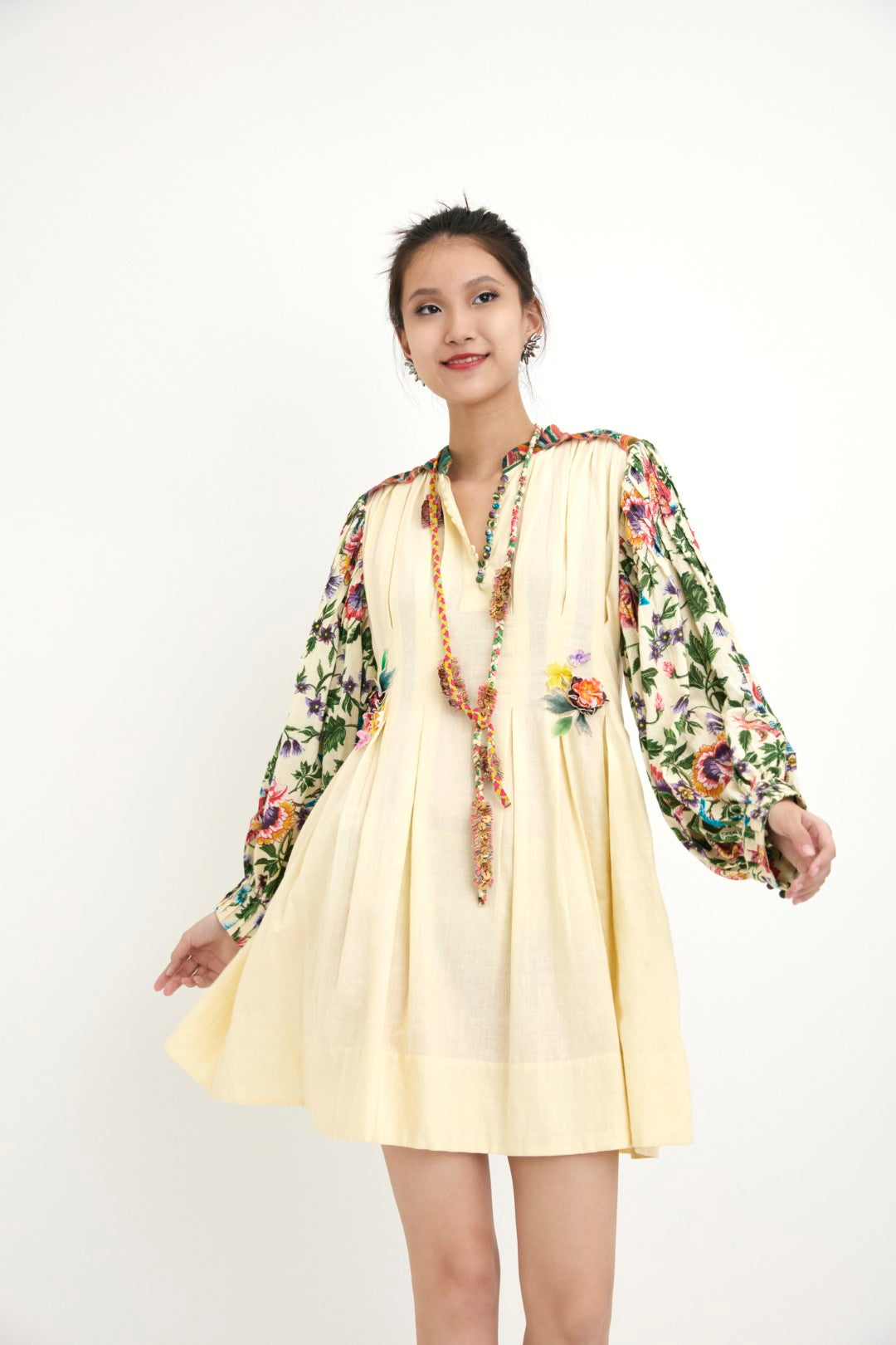 "Handwoven solid cream with cream chintz sleeve detail and hand embroidery in sequins, beads,3D flower.  100% Handwoven cotton; Lining: 100% cotton  100% Azo Free Dry Clean Only"