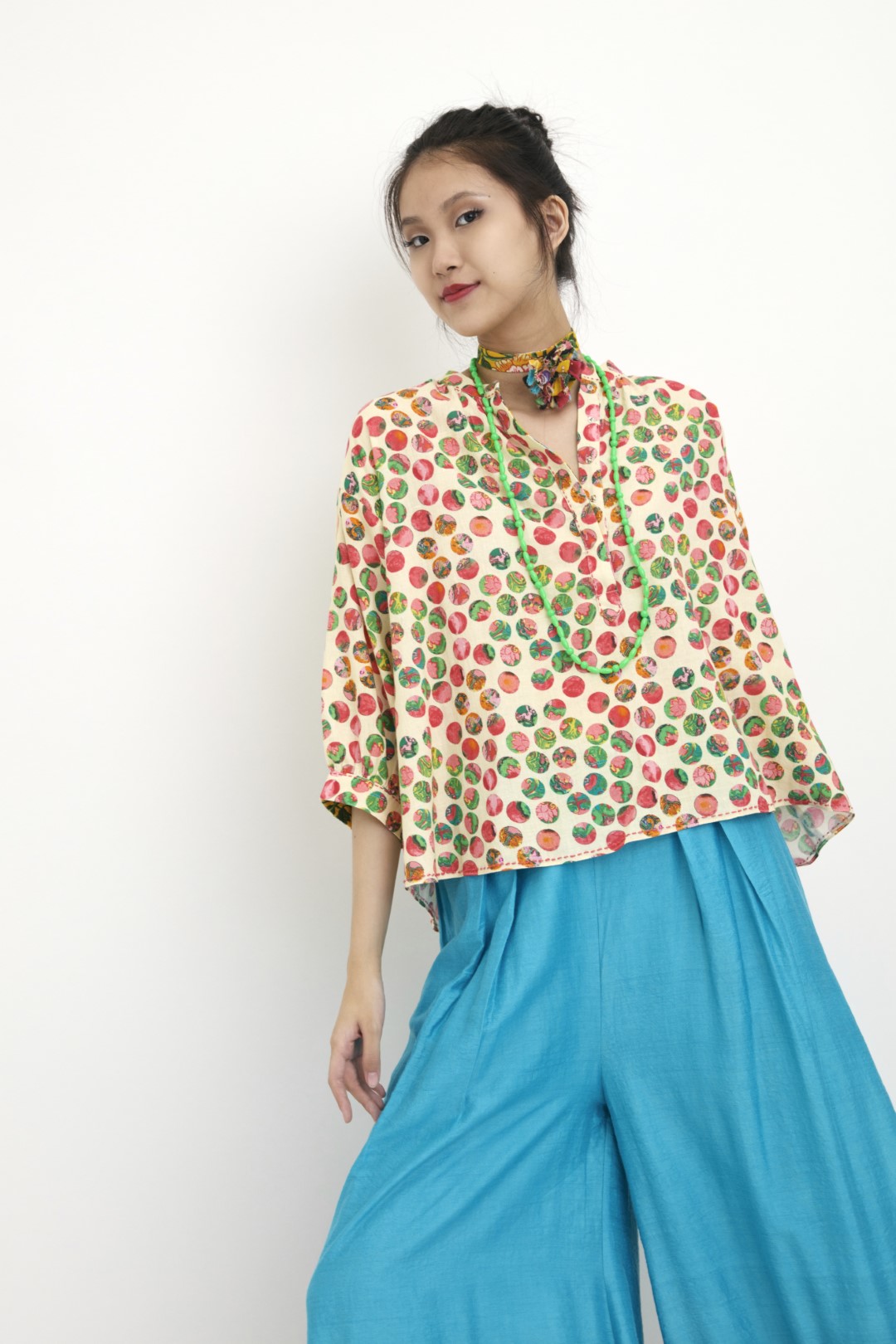 "Handwoven cream polka dot tunic with hand embroidery multi-colored brooch. 100% Handwoven silk 100% Azo Free Dry Clean Only"