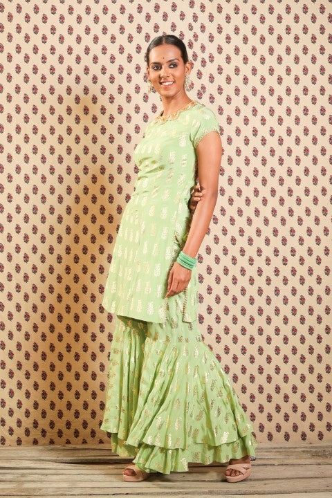 PISTA GREEN ANGRAKHA PAIRED WITH DOUBLE LAYERED SHARARA AND HANDWOVEN KOTA DORIA DUPATTA.