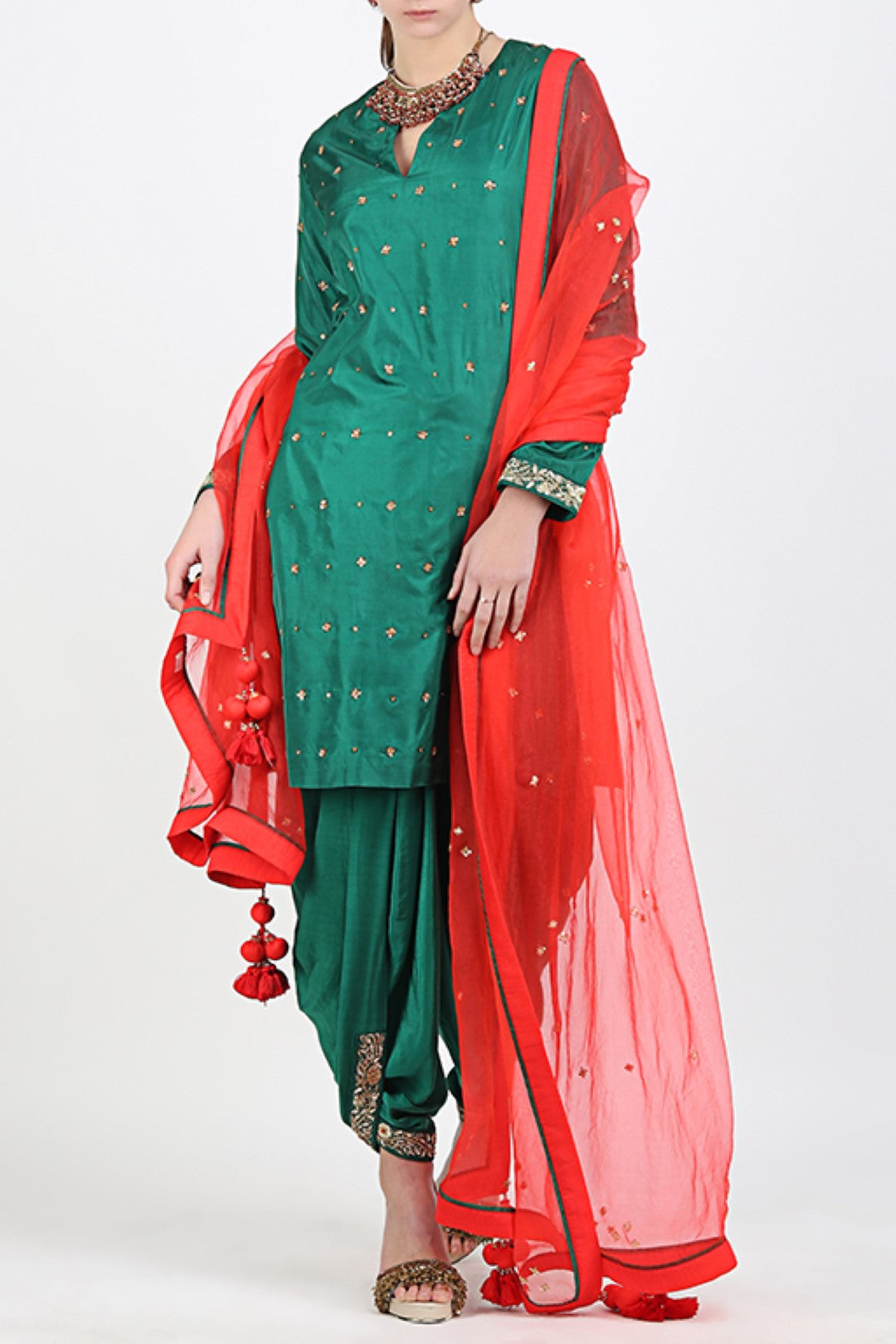 EMERALD GREEN EMBROIDERED SILK KURTA WITH COWL DHOTI AND EMBROIDERED DUPATTA.