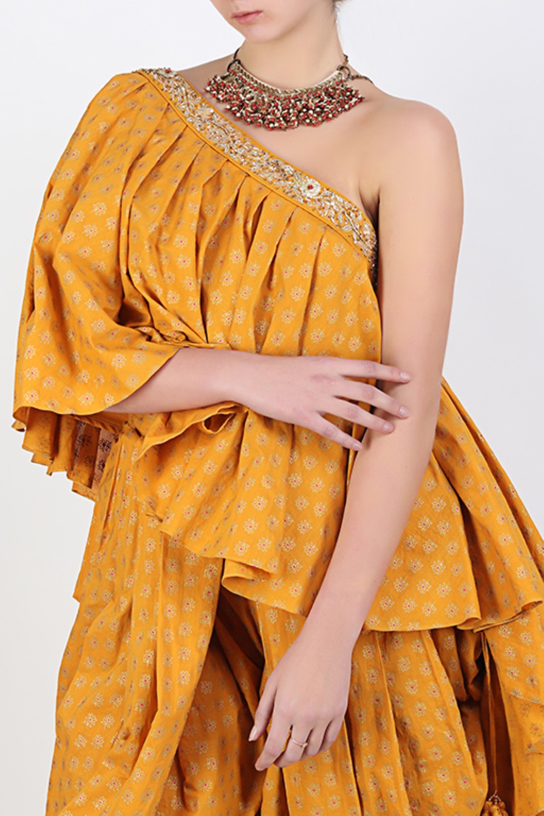 OCHRE SCREEN PRINTED ONE OFF SHOULDER TOP WITH SCREEN PRINTED COWL DHOTI