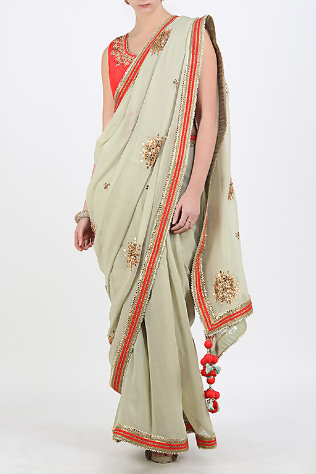 CORAL DUPION SILK EMBROIDERED BLOUSE  WITH JADE EMBROIDERED GEORGETTE SAREE.