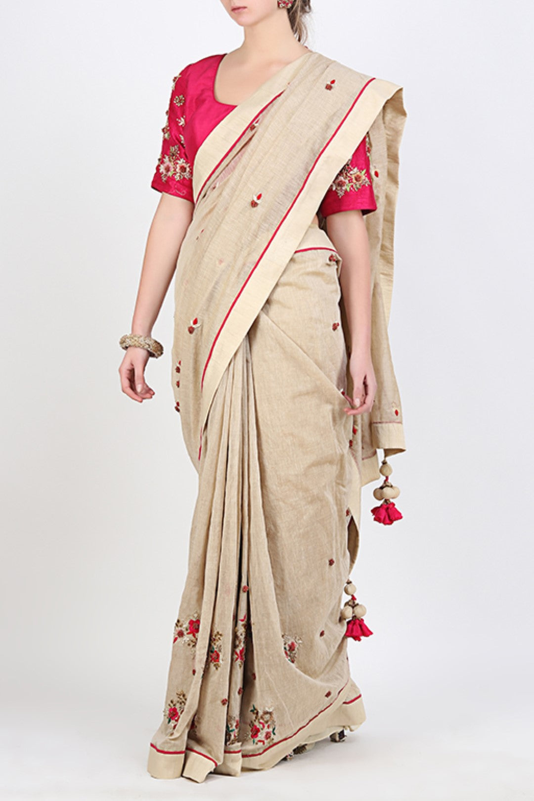 GHEE CHANDERI EMBROIDERED SAREE WITH HOT PINK EMBROIDERED BLOUSE.