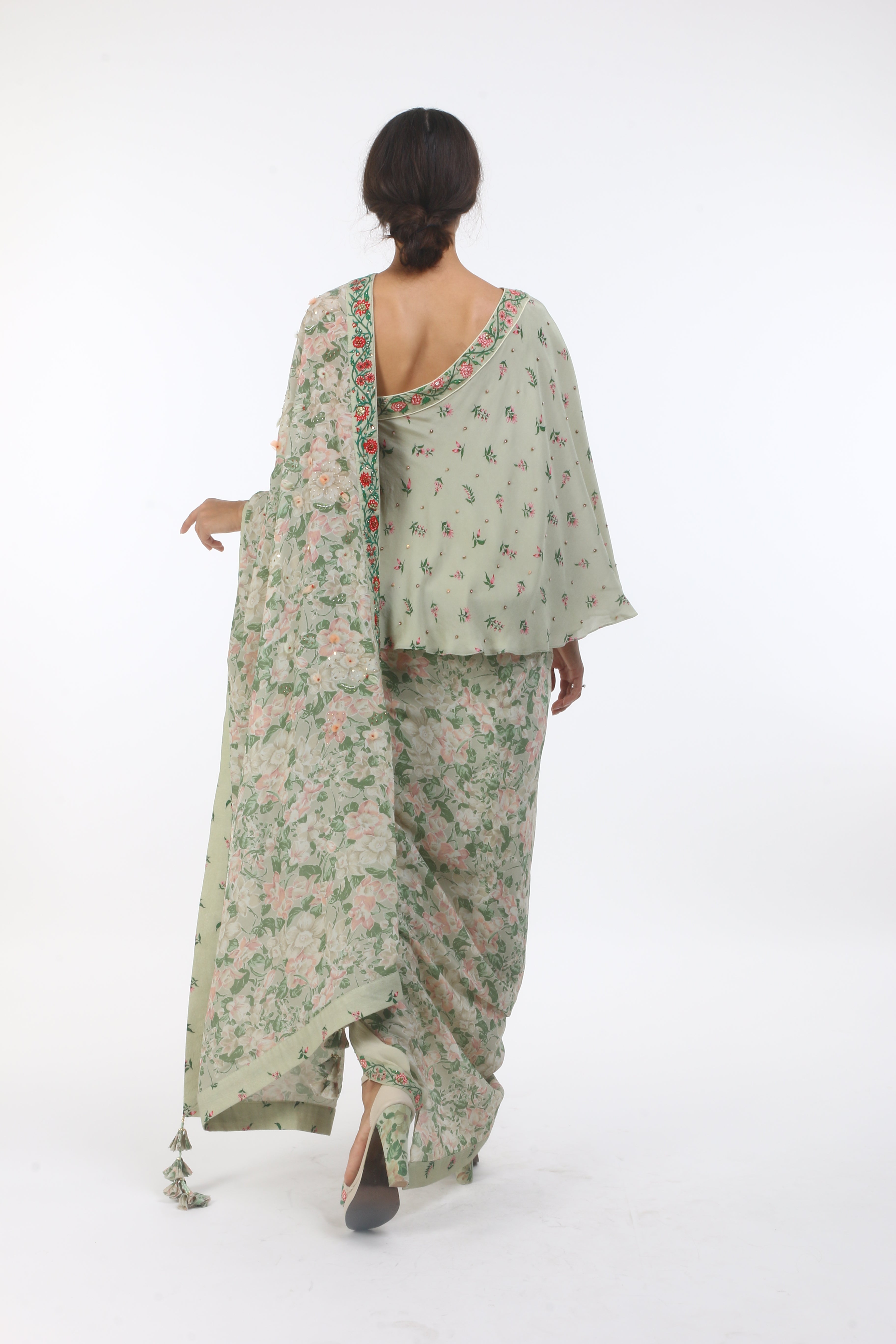 printed and embellished crepe dhoti saree with mumtaz bel border and bouquet printed one shoulder blouse.