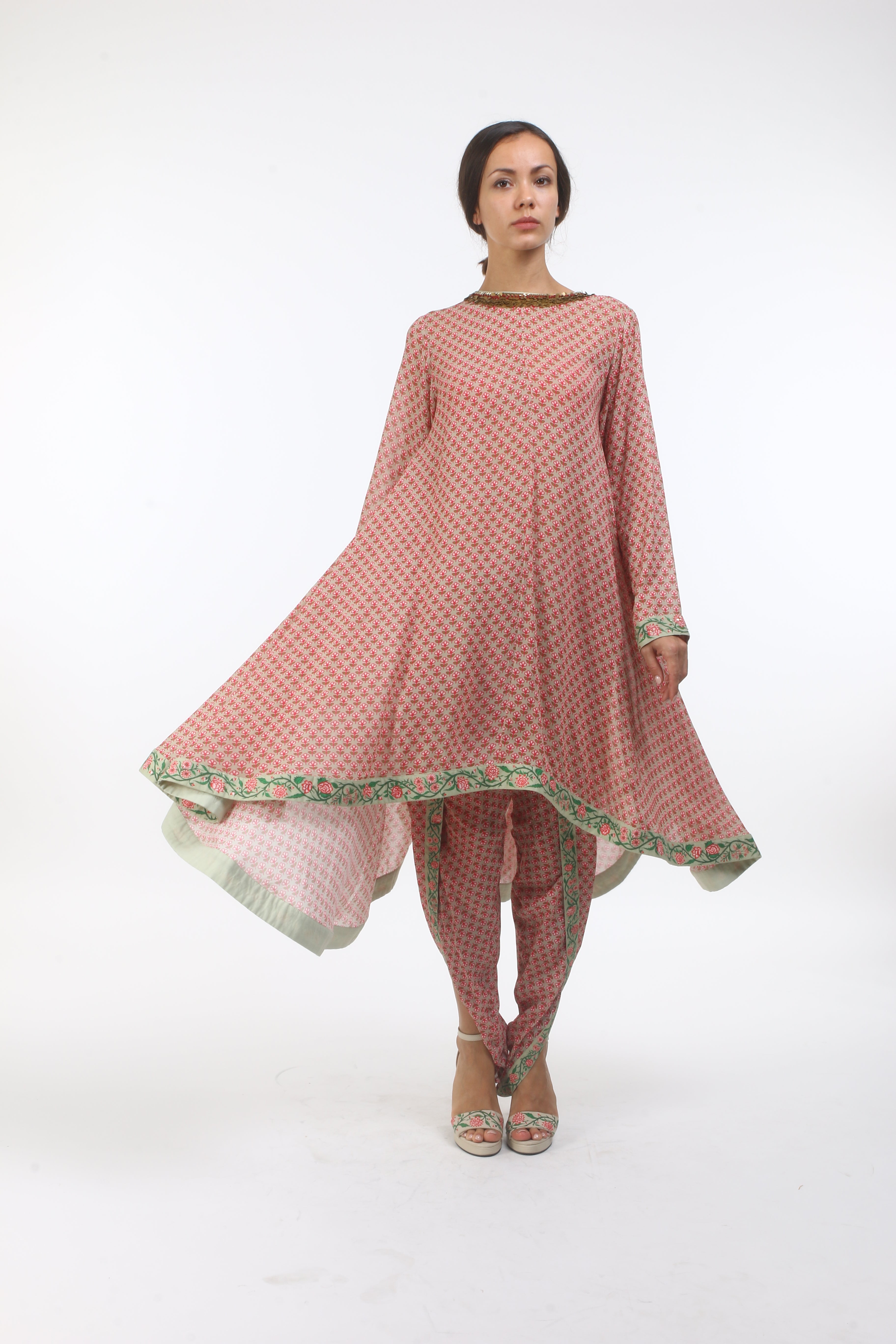 asymmetrical georgette Kurtha in layered coin embroidered neckline with overlap dhoti in crepe.