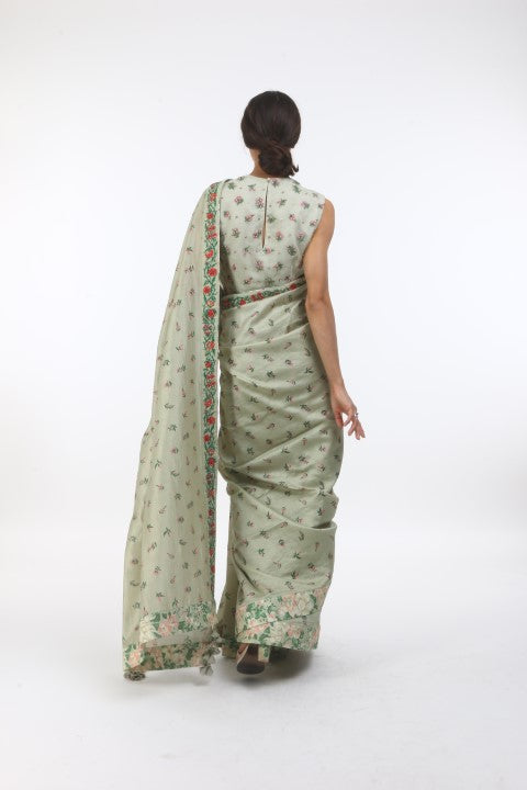 Bloom antique jade bouquet & bibi jaal printed chanderi saree with bouquet embroidered organza blouse.