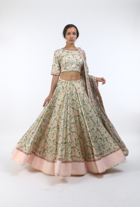 Bloom salmon pink bibi jaal printed chanderi lehenga with organza embroidered cotton blouse in French knot embroidered neckline and chiffon dupatta.